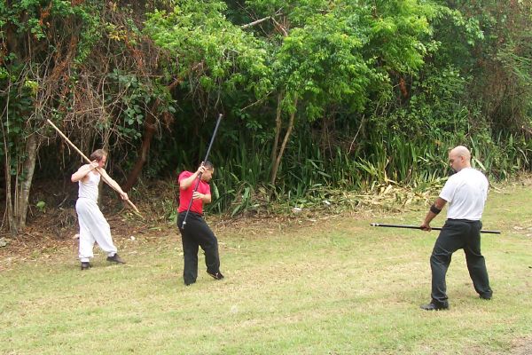 Master Vega and Inst. Delgado work with Inst. Stenson