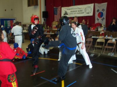 Thomas blocks the kick and sets up his counter