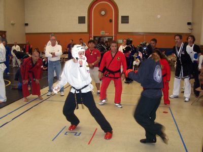 Womens Black Belt Fighting - Prof. Navarro judging Nicole and Cassie