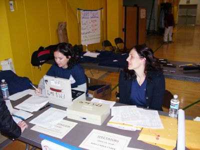 Inst. Kim Leith and Justine man the registration desk